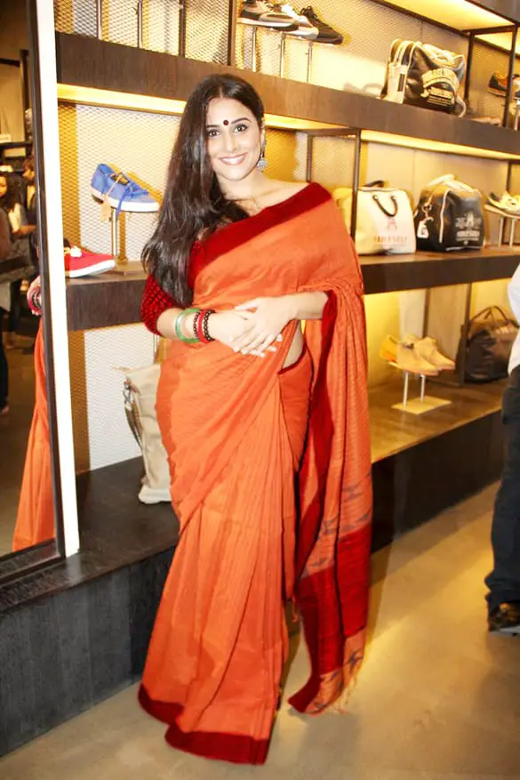 orange saree with maroon border