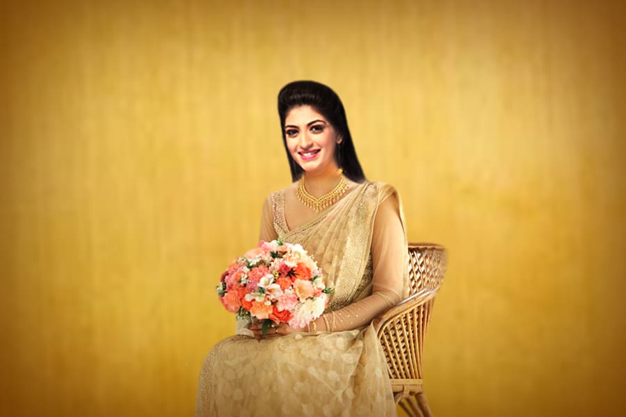 An elegant bride in an exquisite Kavani saree | Wedding Planner in Kerala